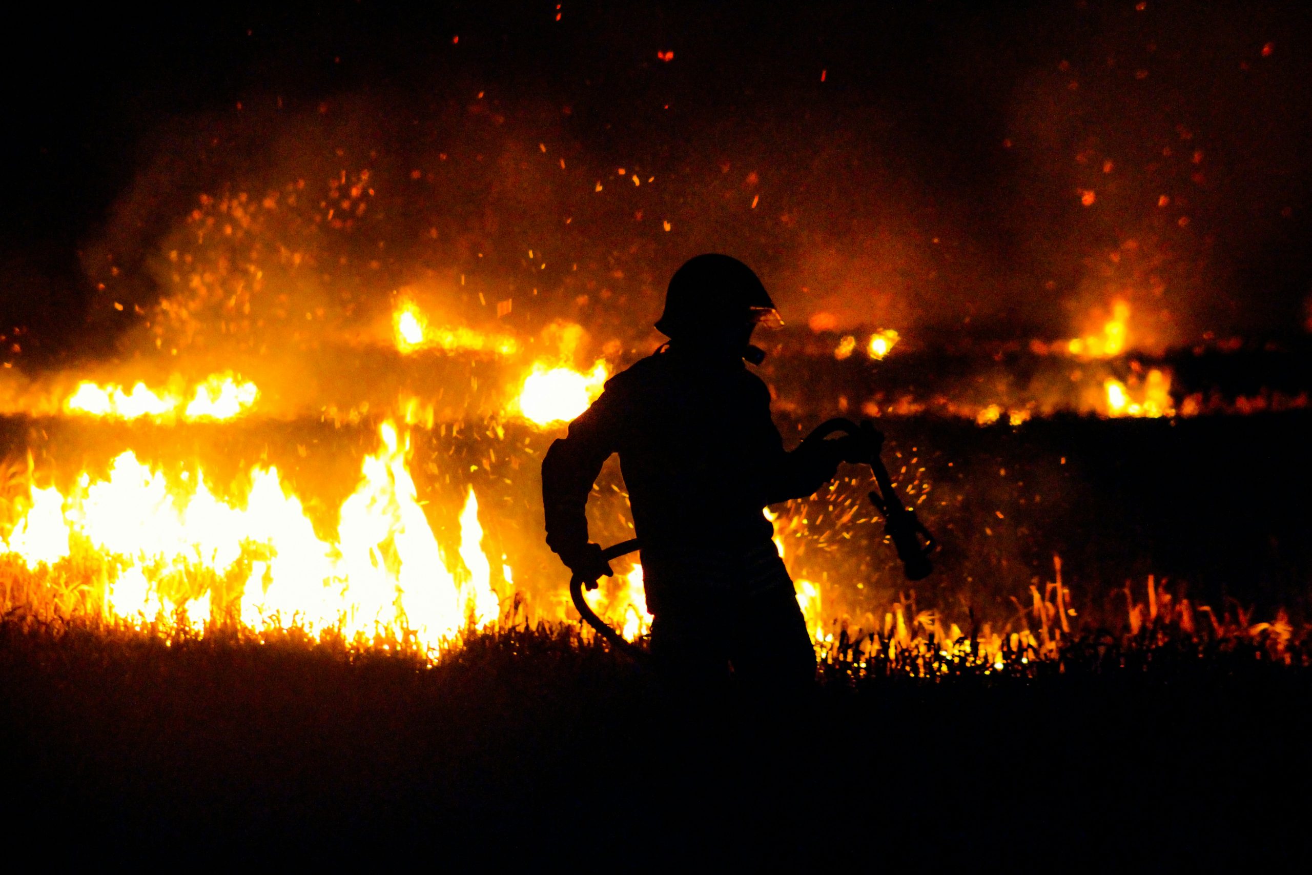Firefighter Putting Out Fire